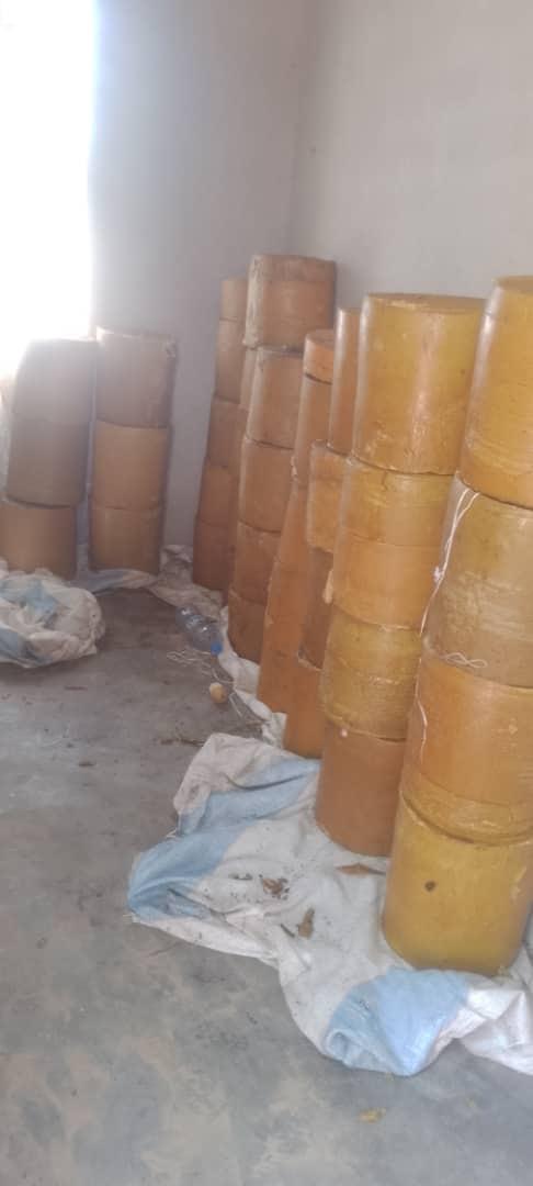 Golden beeswax blocks stacked at QVC Africa’s facility